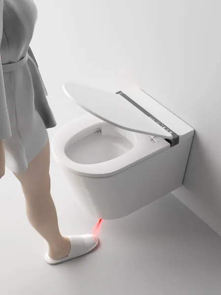 Couvercle d'un WC intelligent qui s'ouvre à l'approche d'une personne